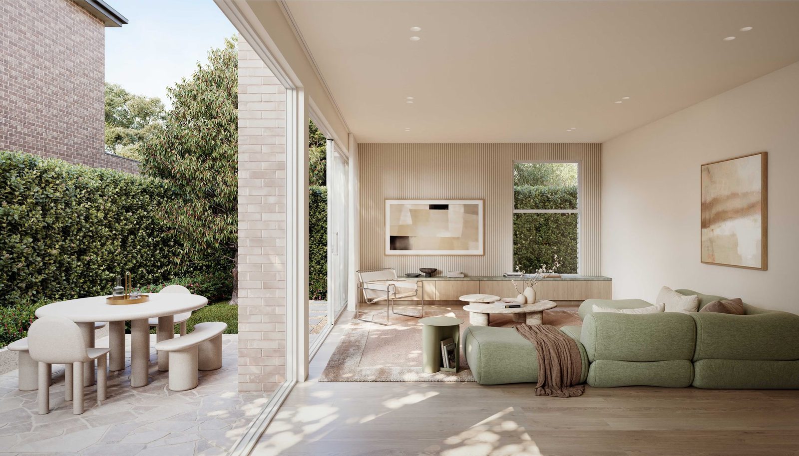 A ground-floor living room opening onto a private garden terrace at DECA Kew. Artist impression.