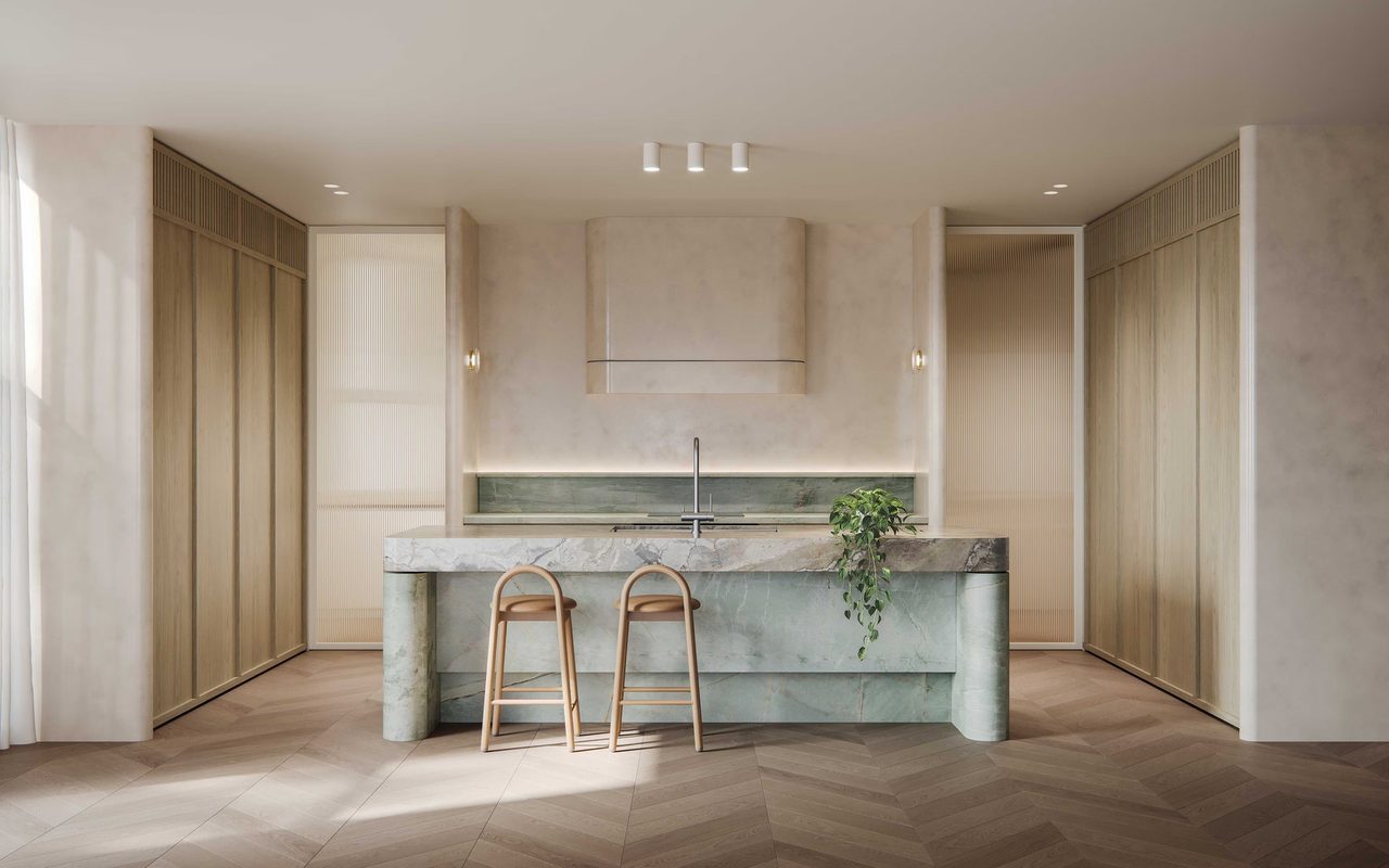 Green stone island and pale timber cabinetry in a DECA penthouse kitchen. Artist impression.